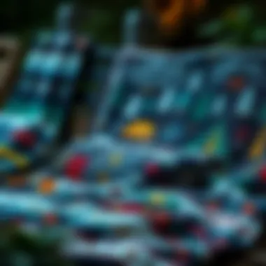 Design variations of camping themed throw blankets displayed