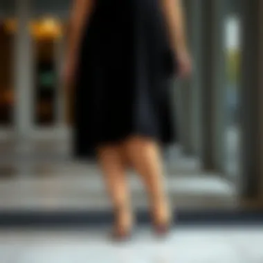 Casual plus size black midi dress paired with trendy shoes