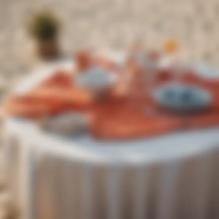 A beautifully designed beach table setup with matching table cloth and decor